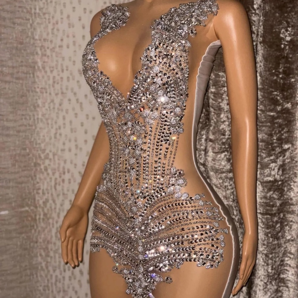 This dress is brand new. Handmade. But has a tare at the bottom of the dress.